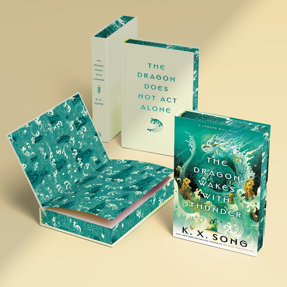 A signed and personalized first edition of Dragon Wakes with Thunder by KX Song, offered by Yu & Me Books, featuring a striking dragon-themed cover.